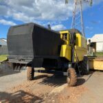 Colheitadeira New Holland | TC57 + PC 18 Pés  | 1999